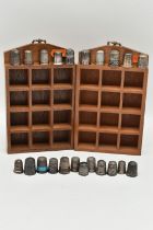 A SELECTION OF SILVER THIMBLES AND TWO DISPLAY UNITS, to include twenty-two thimbles, various
