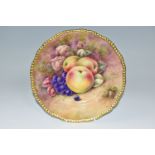 A COALPORT HAND PAINTED CABINET PLATE, with gilt rim, hand painted with apples, grapes and hazel