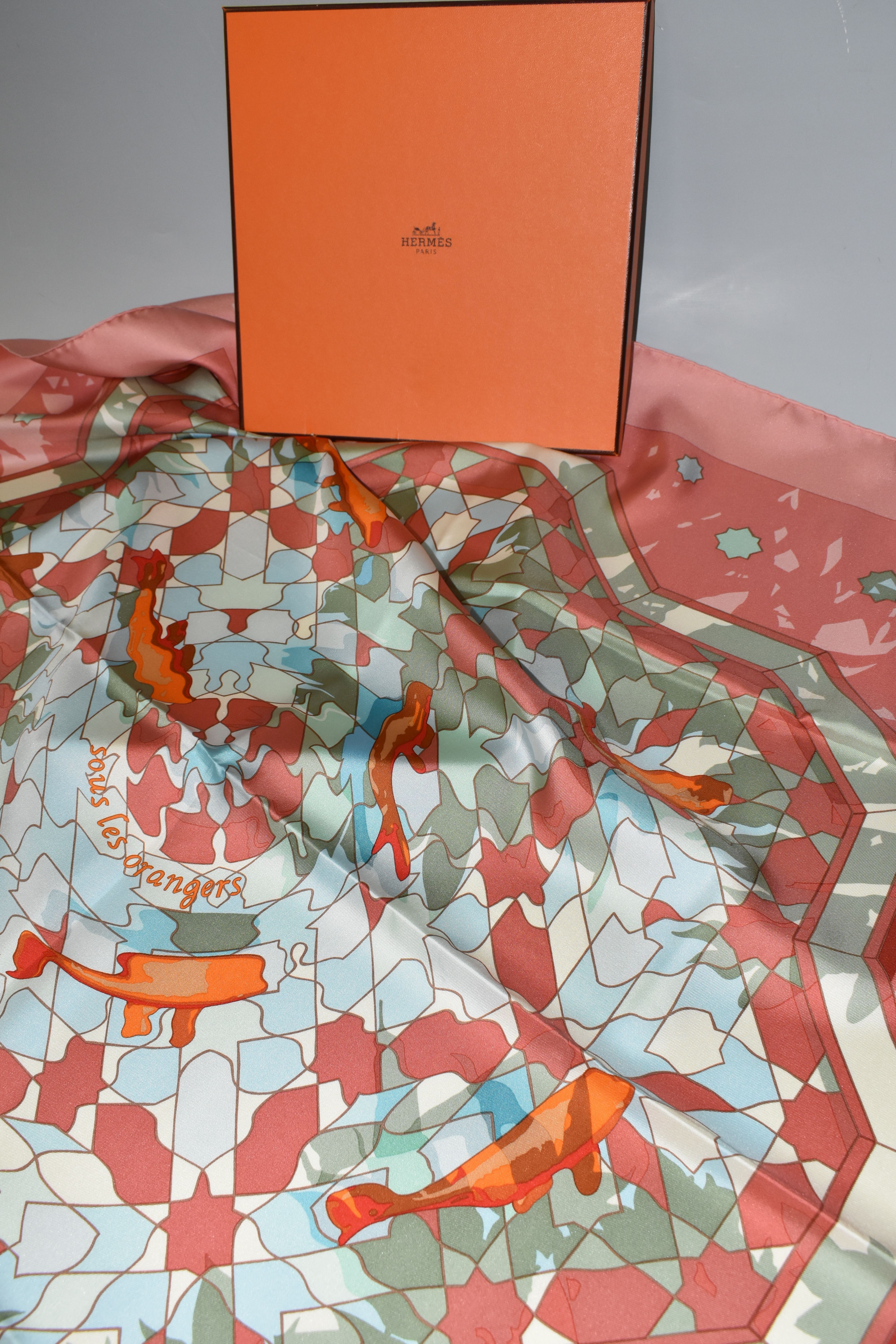 A BOXED HERMÉS PRINTED SILK SCARF, comprising a Dusty Rose/Multi-Col.2 'Sous Les Orangers' design - Image 3 of 3