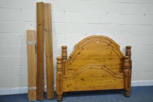 A MODERN PINE 4FT6 BEDSTEAD, with side rails, slats and bolts (condition report: surface scratches)