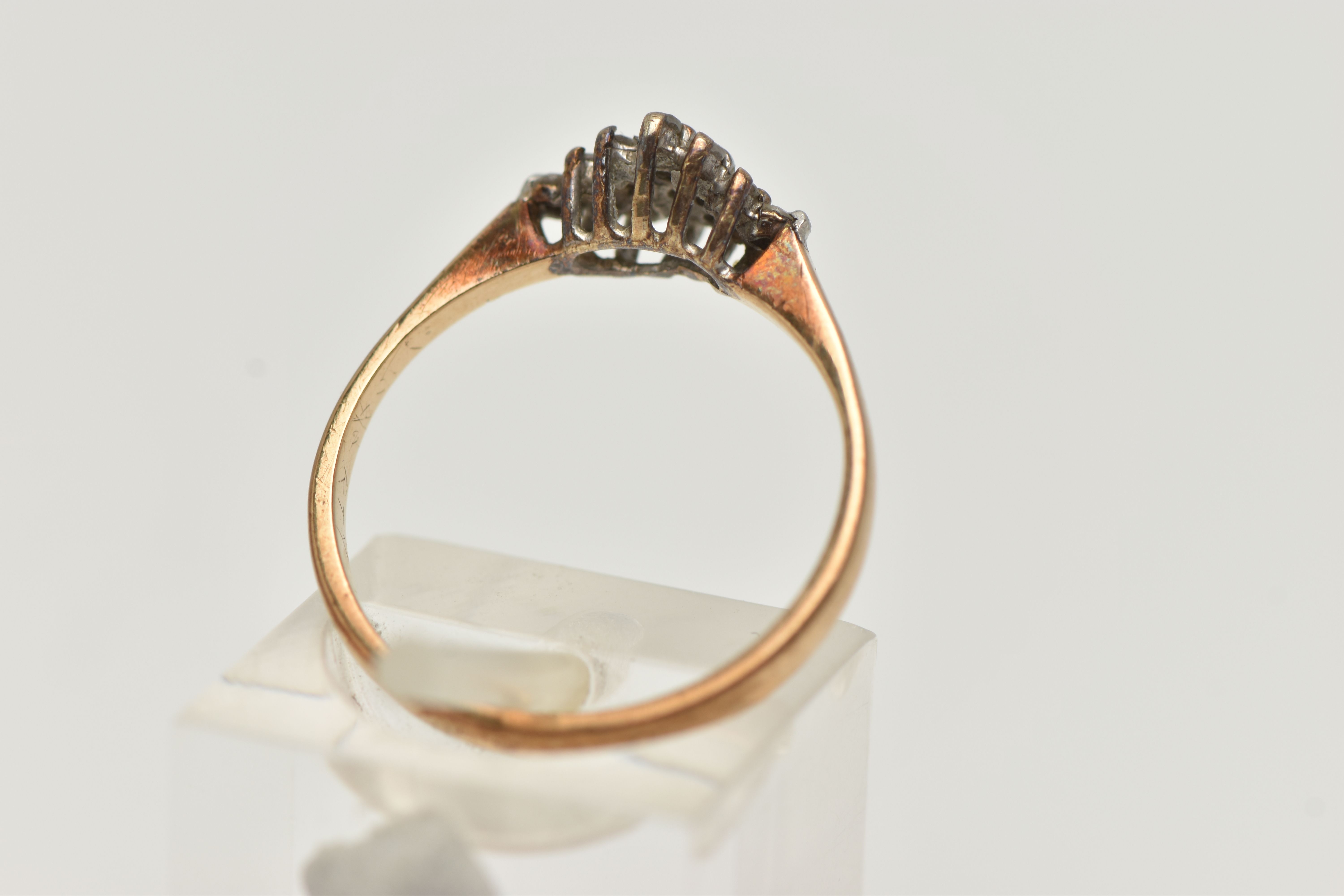 A 9CT GOLD DIAMOND CLUSTER RING, the diamond shape tiered cluster claw set with single cut diamonds, - Image 3 of 4