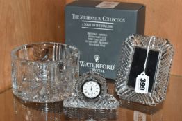 THREE PIECES OF WATERFORD CRYSTAL, to include a boxed The Millennium Collection champagne bottle
