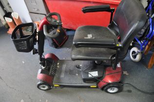 A GO GO ELITE TRAVELLER MOBILITY SCOOTER with battery and charger (charger doesn't appear to