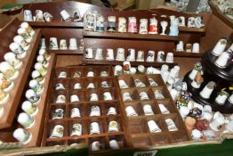 SEVERAL HUNDRED ASSORTED COLLECTORS THIMBLES, to include birds, horses, dogs and tourist themes,