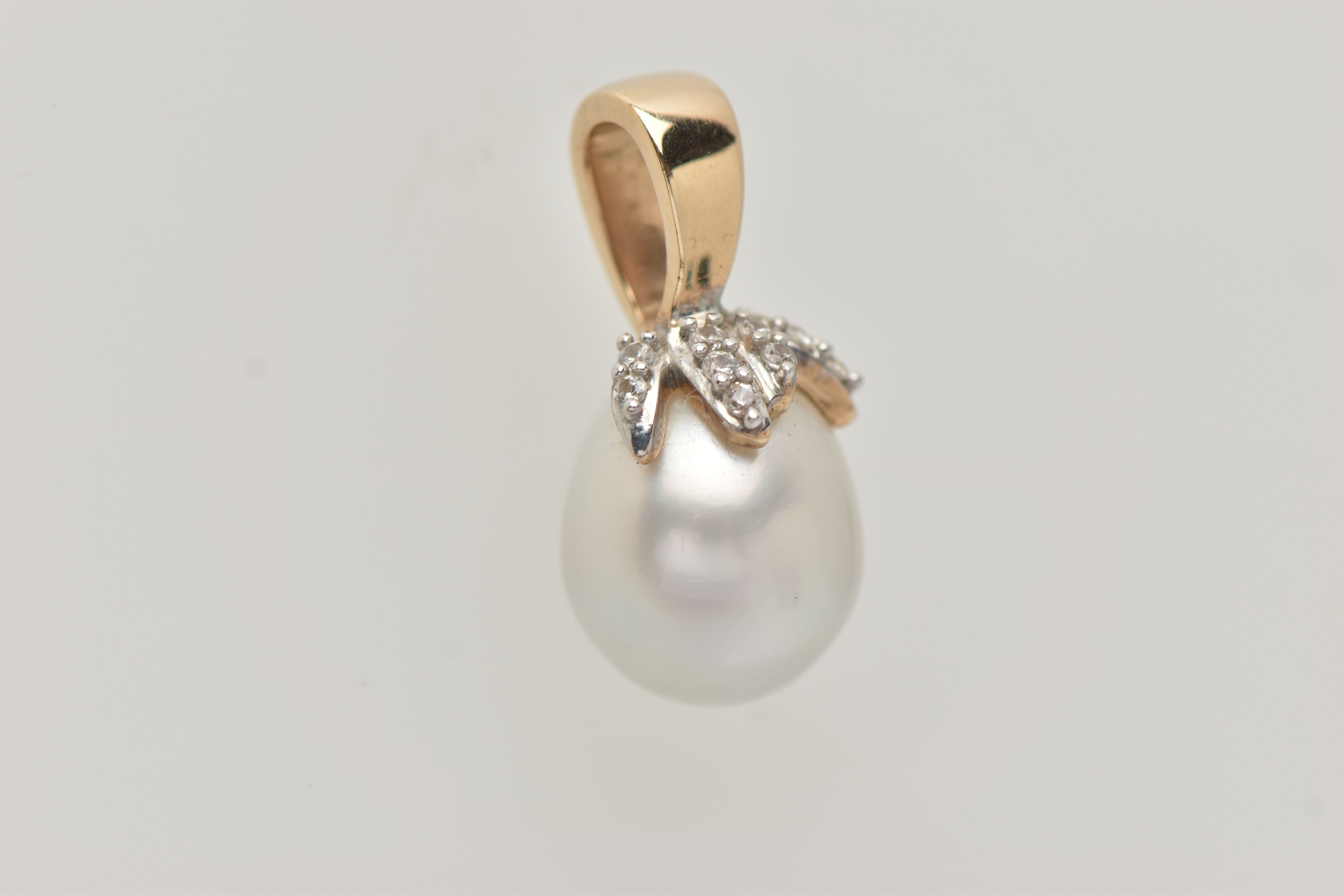 A 9CT WHITE GOLD CULTURED PEARL PENDANT, the cultured pearl drop to the organic design top - Image 2 of 3