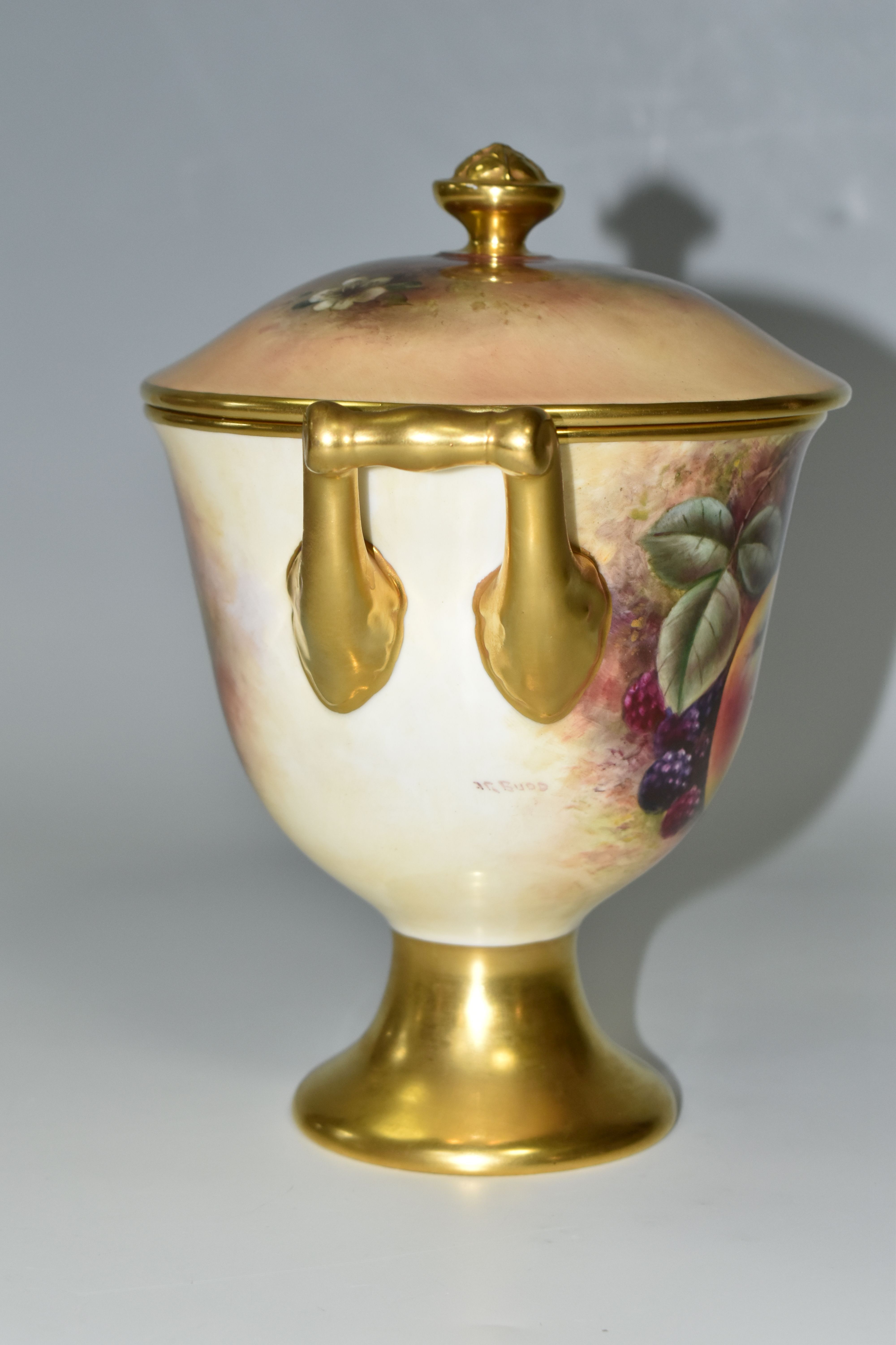 A COALPORT COVERED VASE, the gilt footed vase with twin gilt handles, hand painted with apples, - Image 4 of 8