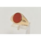 A 9CT GOLD CARNELIAN SIGNET RING, the oval carnelian to the tapered plain band, 9ct hallmark for