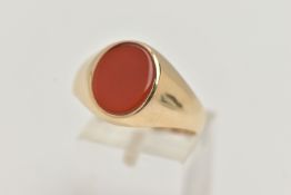 A 9CT GOLD CARNELIAN SIGNET RING, the oval carnelian to the tapered plain band, 9ct hallmark for