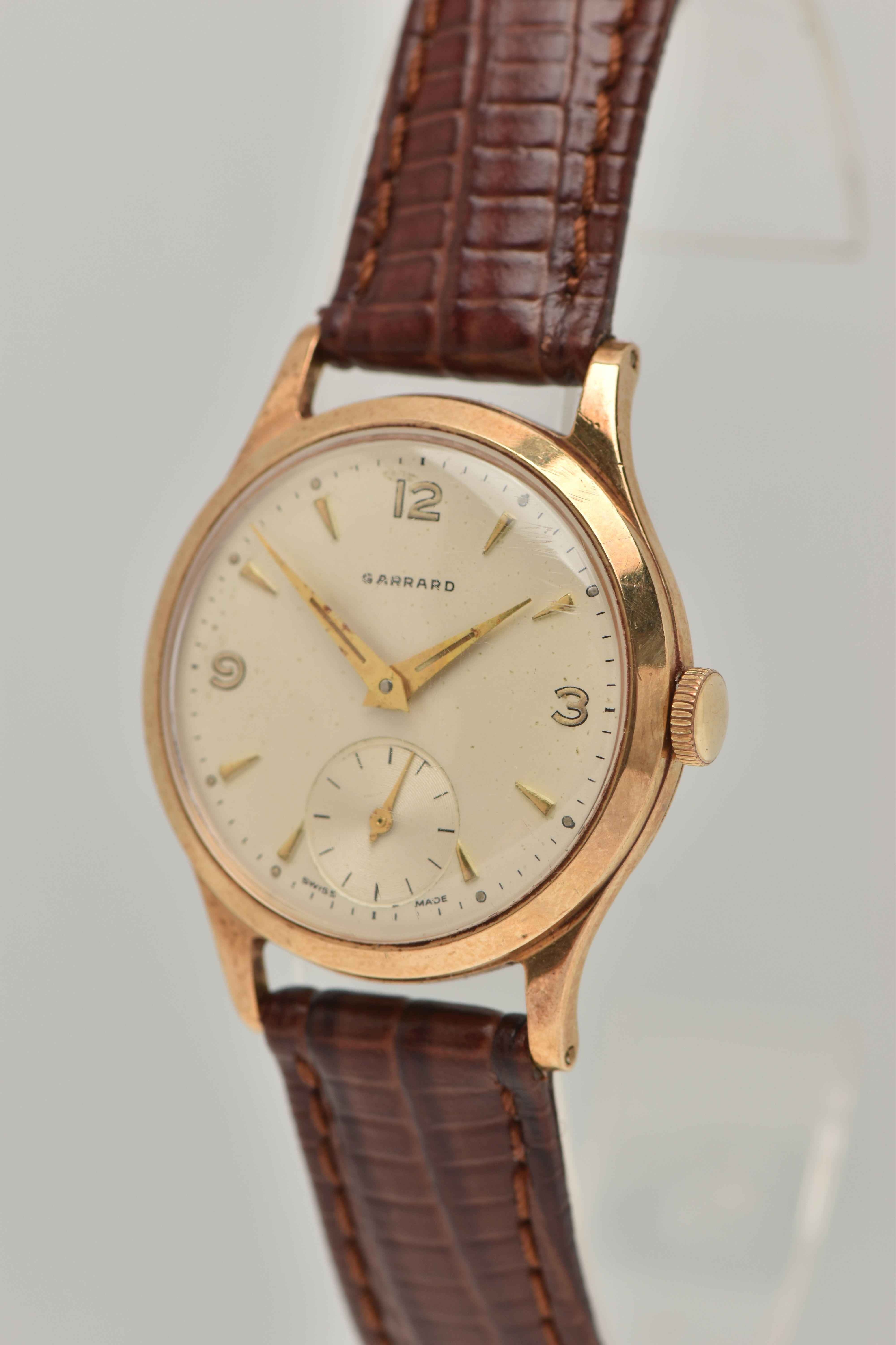 A GARRARD 9CT WRISTWATCH, the circular face with baton and Arabic numerals, a subsidiary seconds - Image 3 of 6