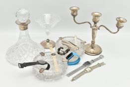 A BOX OF ASSORTED SILVER AND GLASS WARE, to include a silver candle stick, two branches off a