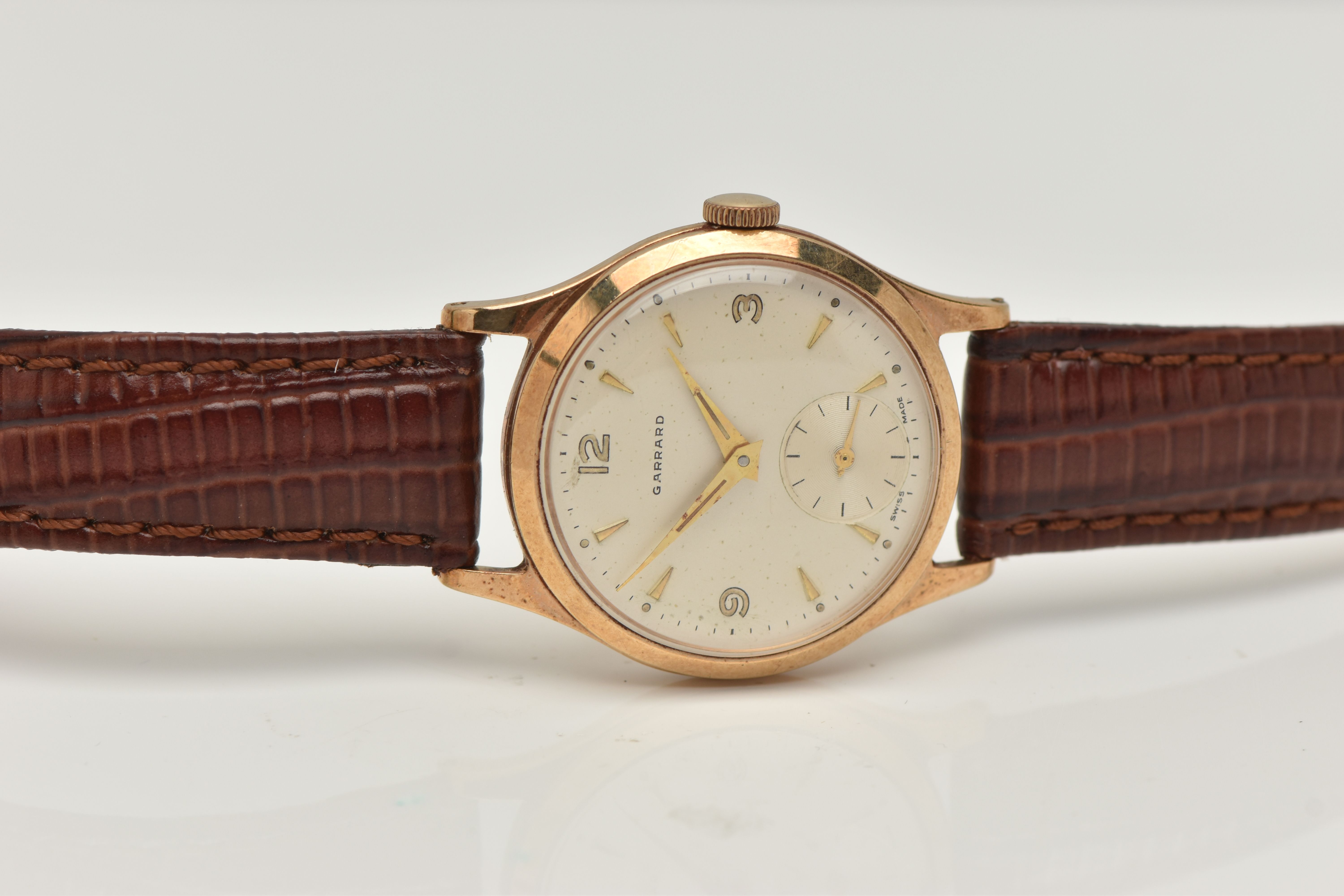 A GARRARD 9CT WRISTWATCH, the circular face with baton and Arabic numerals, a subsidiary seconds - Image 4 of 6