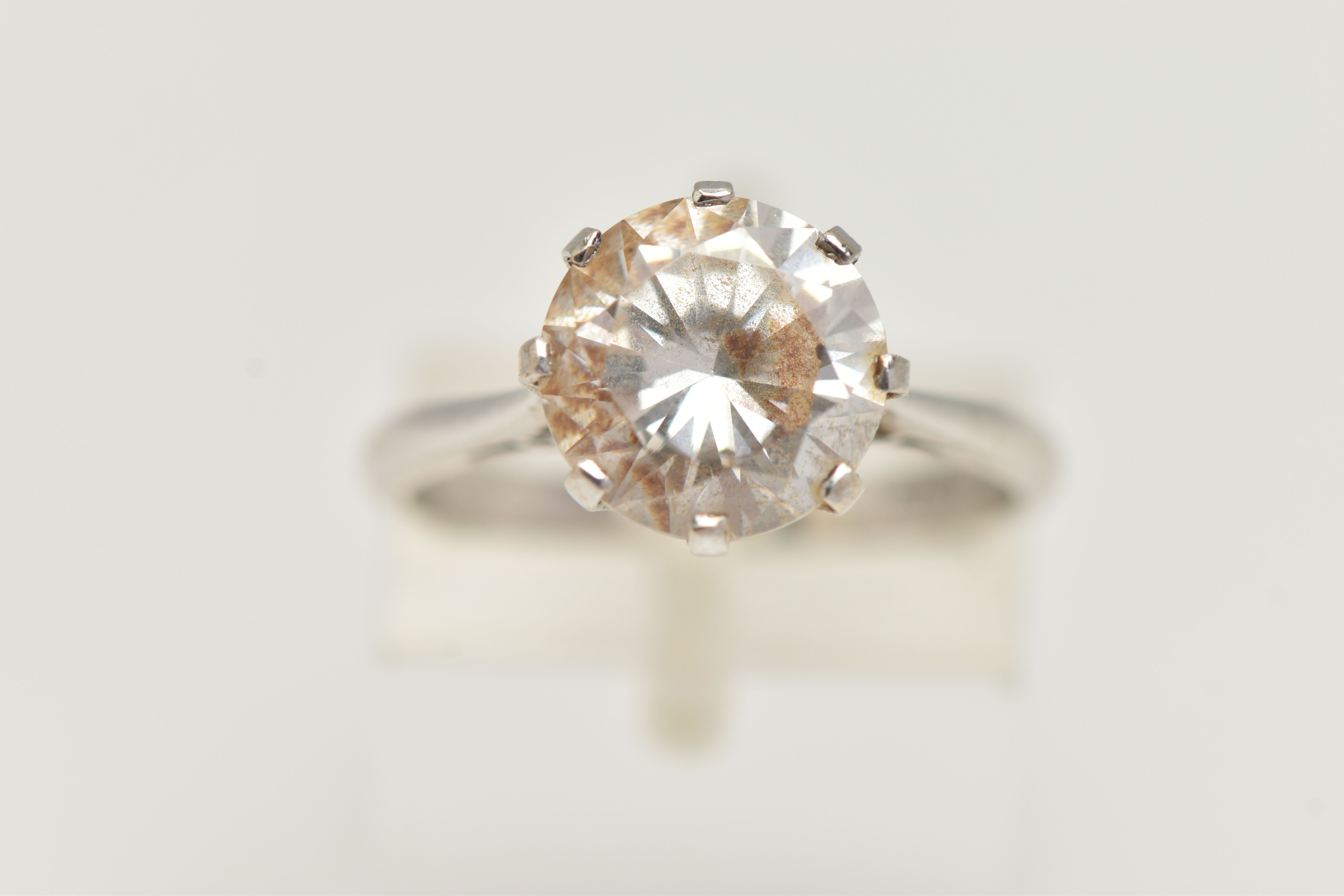 A 9CT WHITE GOLD SINGLE STONE CUBIC ZIRCONIA RING, the circular cut cubic zirconia in an eight - Image 5 of 5