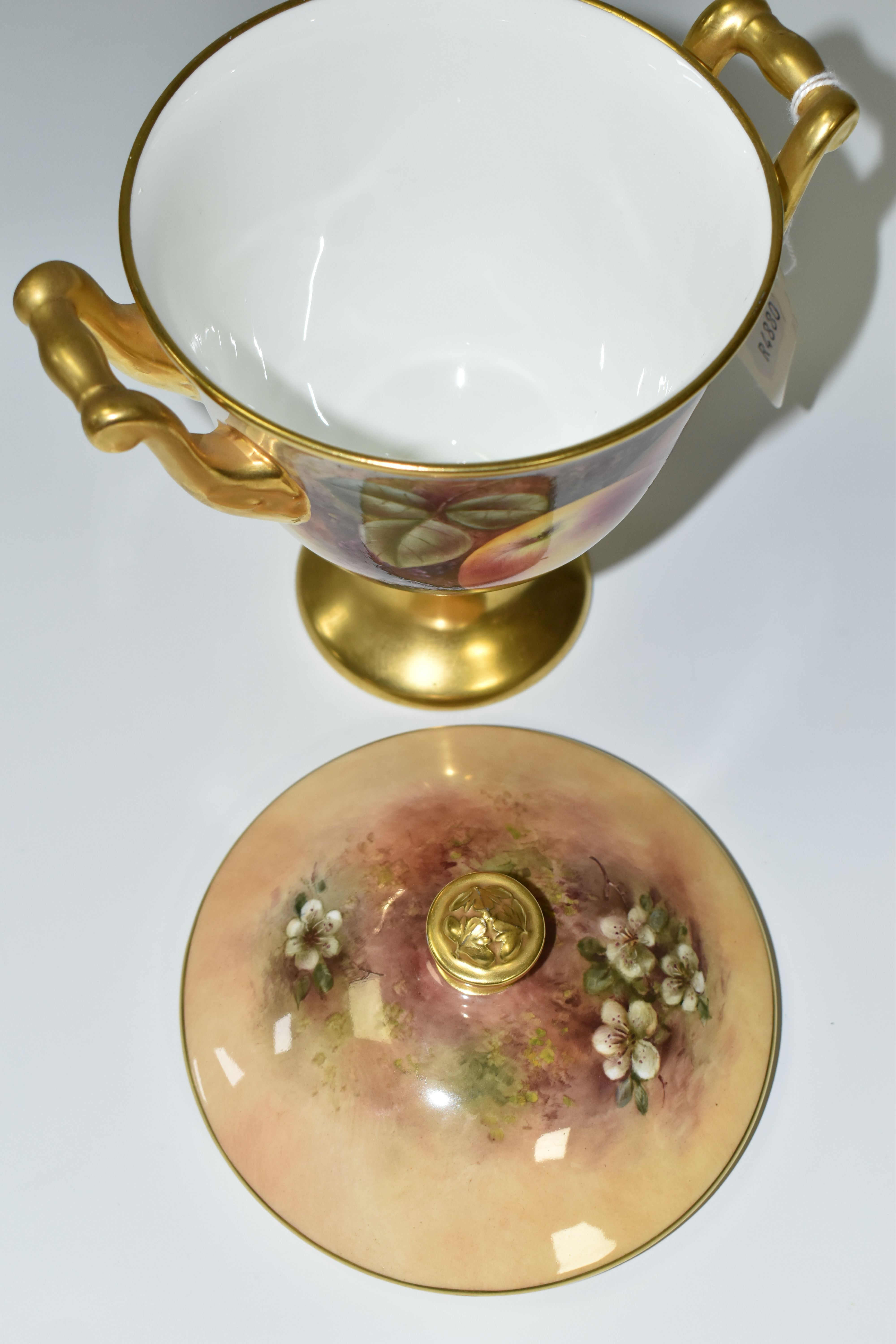 A COALPORT COVERED VASE, the gilt footed vase with twin gilt handles, hand painted with apples, - Image 6 of 8