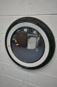 A BESPOKE CIRCULAR MIRROR, made from a Dunlop D402 Harley Davidson tyre, diameter 67cm (condition