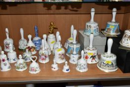THIRTY ORNAMENTAL CERAMIC BELLS, to include boxed and unboxed Hammersley year bells, together with