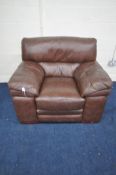 A BROWN LEATHER UPHOLSTERED ARMCHAIR, width 116cm x depth 90cm x height 90cm (condition report: fire