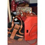 TWO BOXES OF LADIES' HANDBAGS, mostly new and unused, to include twenty four hand bags and