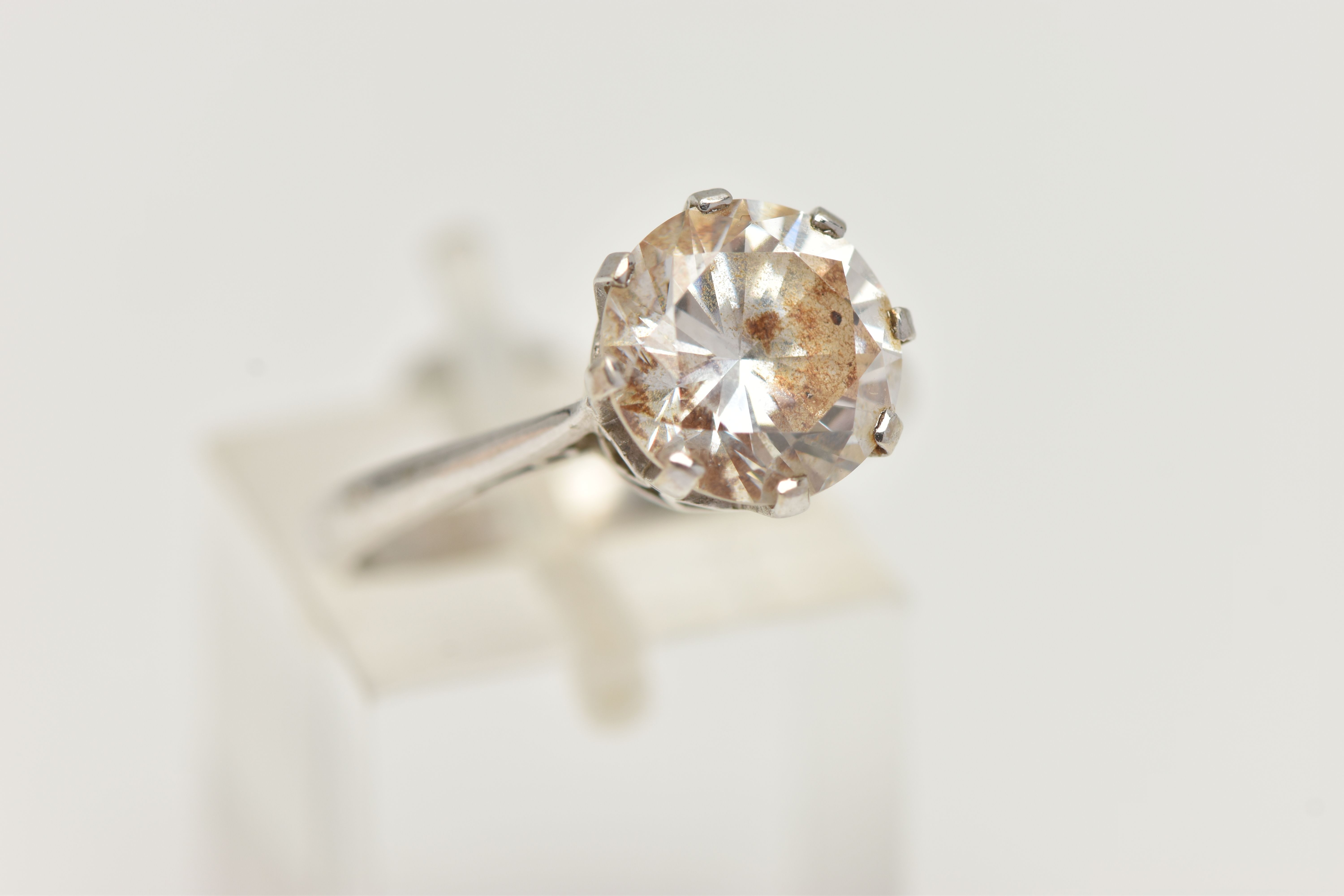 A 9CT WHITE GOLD SINGLE STONE CUBIC ZIRCONIA RING, the circular cut cubic zirconia in an eight - Image 4 of 5