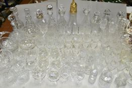 A QUANTITY OF CUT GLASS WARES ETC, to include eleven decanters including a Stuart example, a gilt