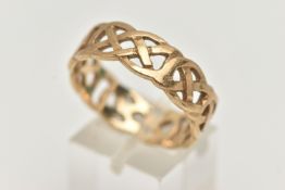 A 9CT GOLD CELTIC PATTERN RING, wide open work band, approximate band width 7.4mm, hallmarked 9ct