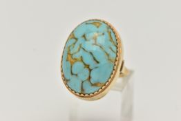 A GLASS CABOCHON RING, designed as an oval glass turquoise imitation cabochon, stamped 18ct,