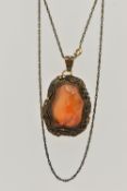 A CONTINENTAL PENDANT, the Chinese style pendant designed as a polished agate within a floral and