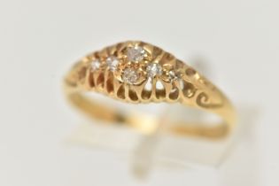 AN 18CT GOLD DIAMOND BOAT RING, five old cut diamonds and one single cut diamond prong set in yellow
