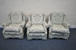 A SET OF THREE TEAL AND FLORAL UPHOLSTERED ARMCHAIRS, width 81cm x depth 91cm x height 77cm (