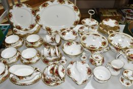 ROYAL ALBERT 'OLD COUNTRY ROSES' TEA AND DINNER WARES, comprising six cups and saucers - one cup