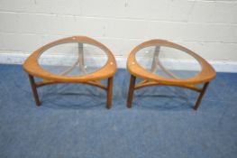A PAIR OF 20TH CENTURY NATHAN TEAK TRIANGULAR COFFEE TABLES, with glass inserts, united by shaped