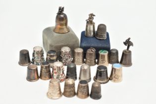 A SELECTION OF SILVER THIMBLES, twenty-two thimbles and a silver tooth fairy trinket box, various