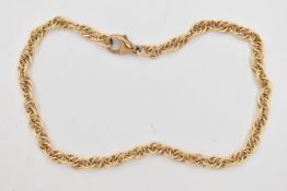 A 9CT GOLD FANCY LINK BRACELET, fitted with a lobster clasp, hallmarked 9ct Birmingham, length