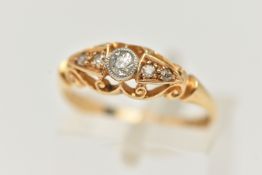 AN 18CT GOLD DIAMOND RING, an old cut diamond bezel set with milgrain detail flanked with three