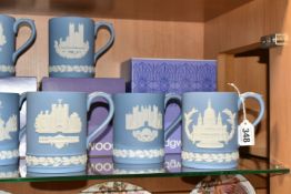 A COLLECTION OF TEN BOXED WEDGWOOD BLUE JASPERWARE CHRISTMAS MUGS, comprising 1971 Piccadilly