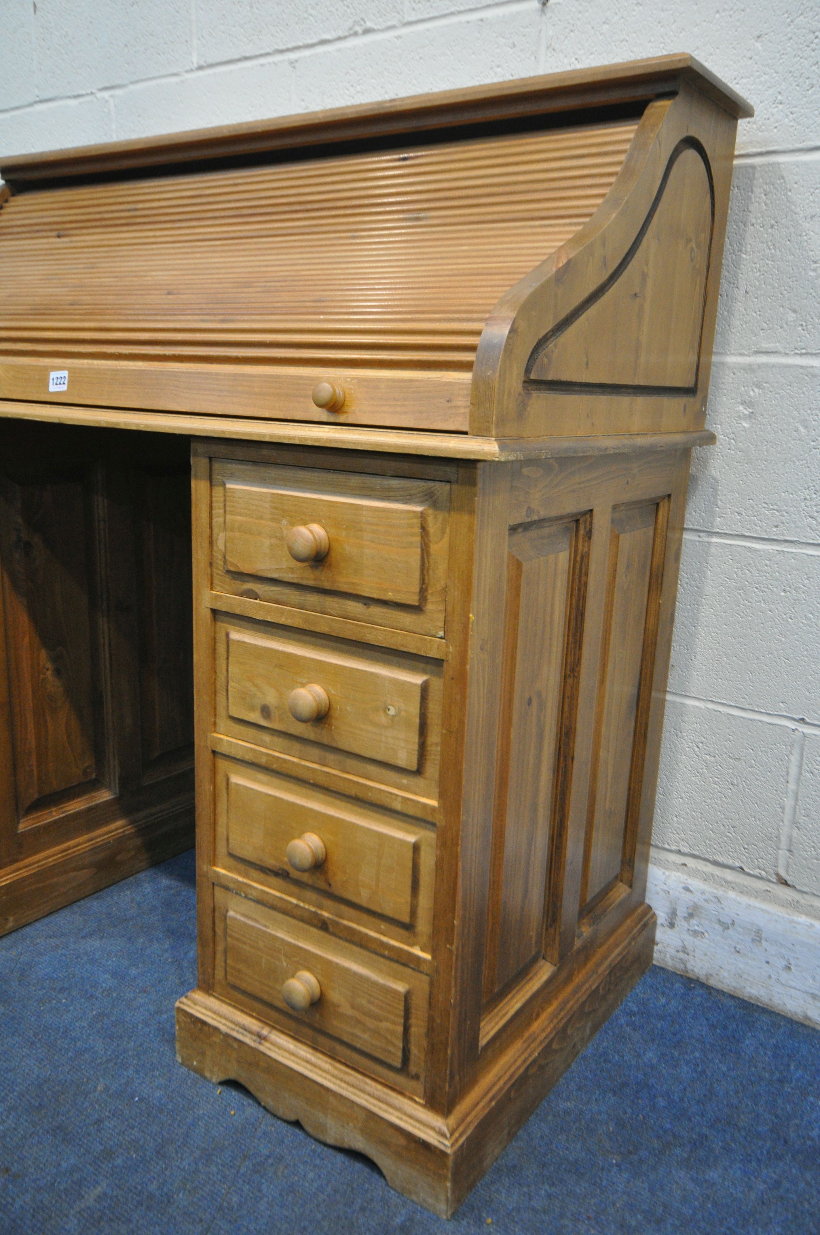 A PINE ROLL TOP PEDESTAL DESK, enclosing an arrangement of shelving and drawers, over a two eight - Image 4 of 4