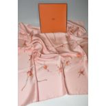A BOXED HERMÉS PRINTED SILK SCARF, comprising a 'Fleurs De Fuchsia' design scarf, designed by
