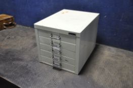A VINTAGE METAL FILE DRAWER OF FIVE DRAWERS badged George T Gurr, each drawer with photographic