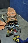 A VINTAGE GOLF BAG CONTAINING CLUBS by MacGregor, Ben Sayers, Dunlop, Slazenger and Gallet