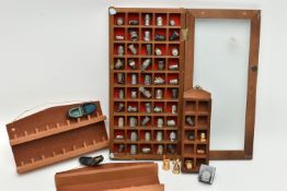 ASSORTED WHITE METAL THIMBLES AND THIMBLE DISPLAY CASES, to include a wooden fifty piece wall
