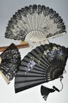 THREE FOLDING FANS, comprising a boxed mother of pearl and black lace fan, with painted flowers