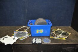 A TRAY CONTAINING CUTTING AND GRINDING DISCS and circular saw blades including a 6in dado set with