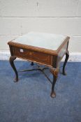AN EDWARDIAN MAHOGANY AND INLAID PIANO STOOL, blue padded seat, on cabriole legs, and a cross