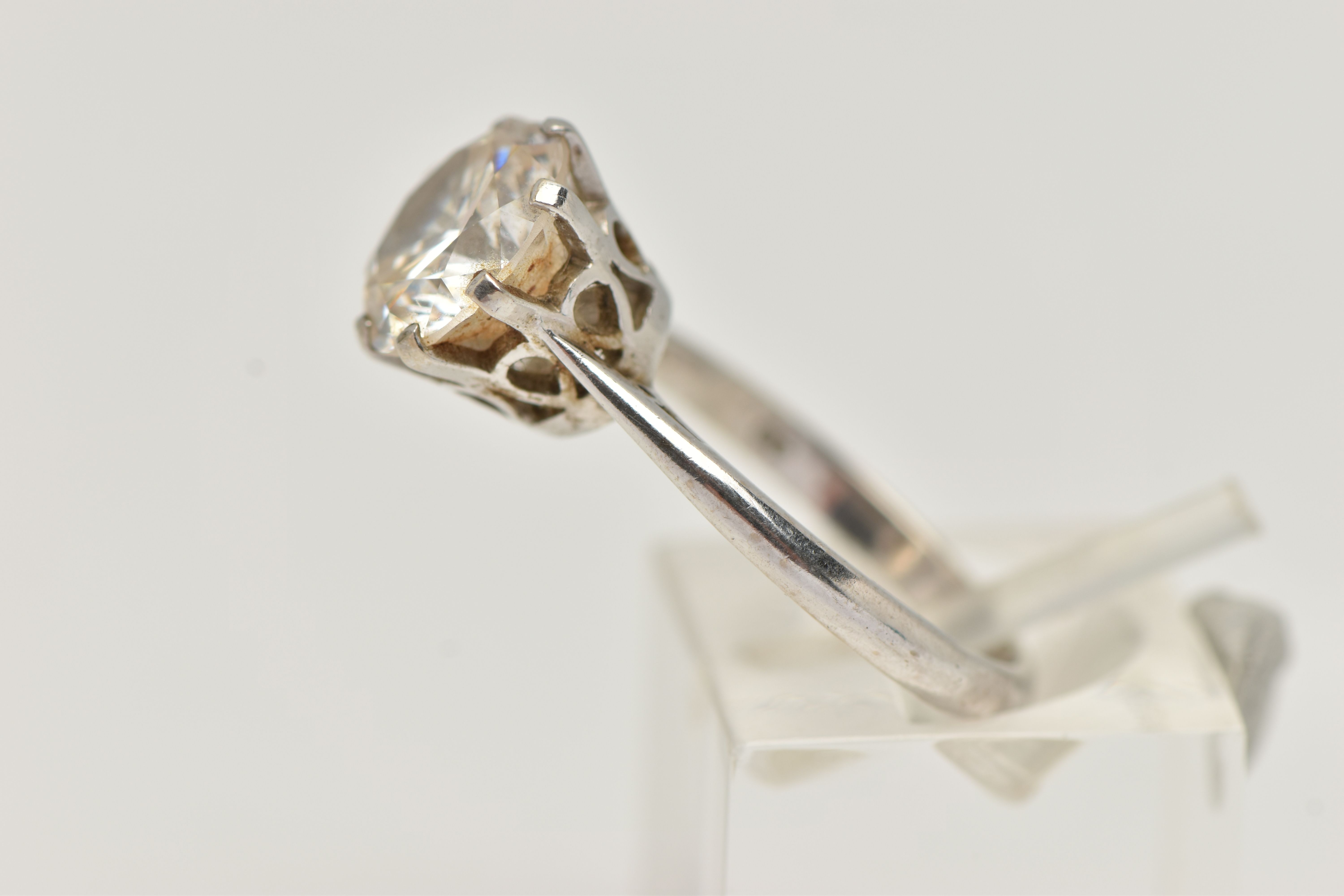 A 9CT WHITE GOLD SINGLE STONE CUBIC ZIRCONIA RING, the circular cut cubic zirconia in an eight - Image 2 of 5