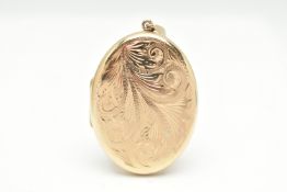 A 9CT GOLD OVAL LOCKET PENDANT, floral pattern to the front, polished reverse, hallmarked 9ct