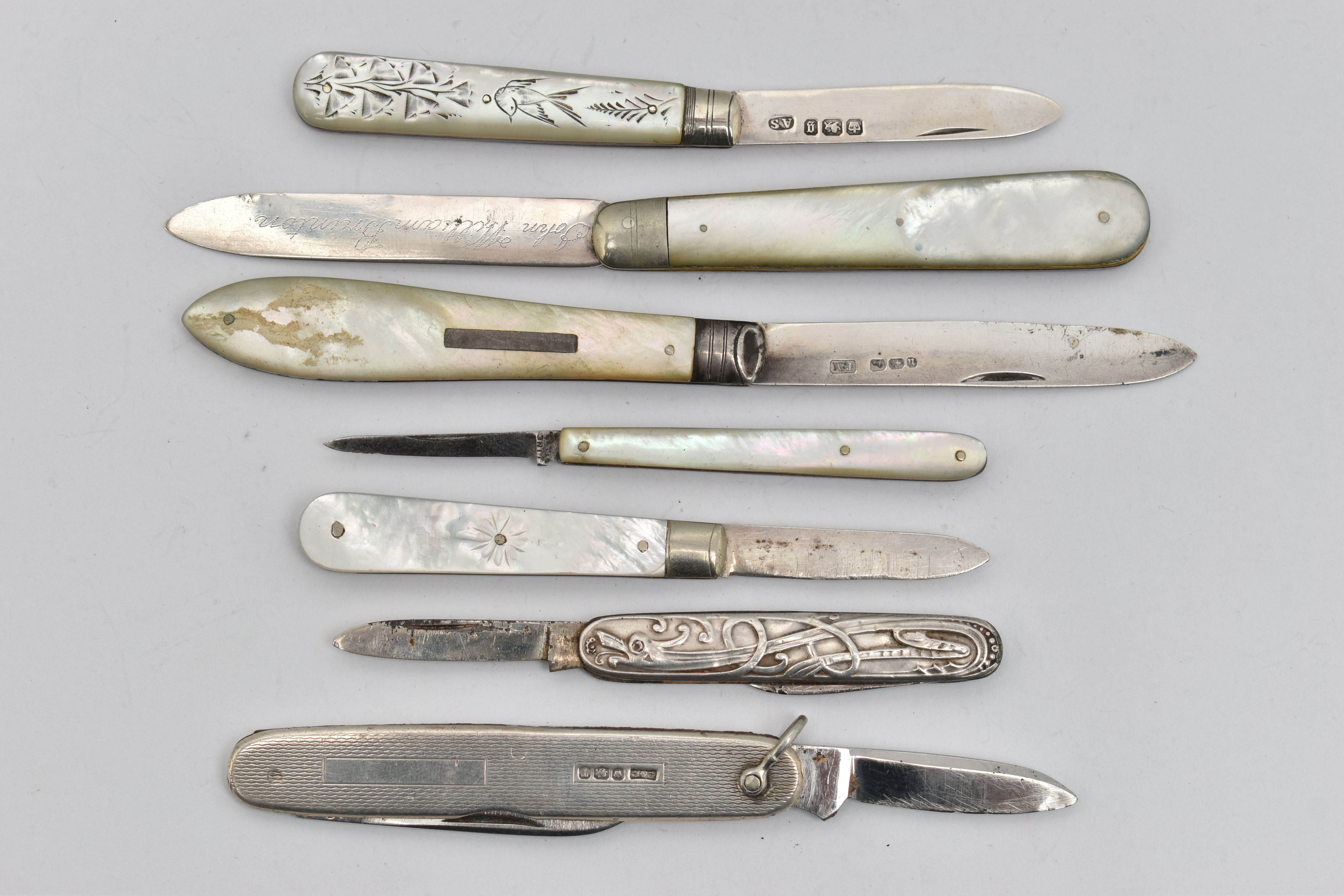 FIVE FRUIT/POCKET KNIVES AND TWO OTHERS, four fitted with silver blades and mother of pearl handles, - Image 2 of 2