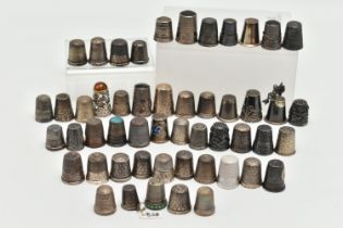 A BAG OF WHITE METAL THIMBLES, various designs and patterns, some set with semi-precious stone