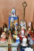 SEVENTEEN CHRISTMAS THEMED BELLS, to include a Capodimonte bell with some restoration to the