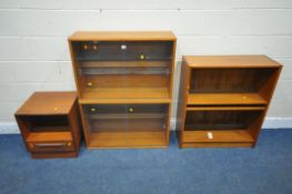 A PAIR OF 20TH CENTURY TEAK BOOKCASES, with double glazed sliding doors, each with two glass
