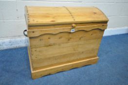 A 20TH CENTURY PINE TRUNK, with a domed top and twin handles, width 80cm x depth 47cm x height
