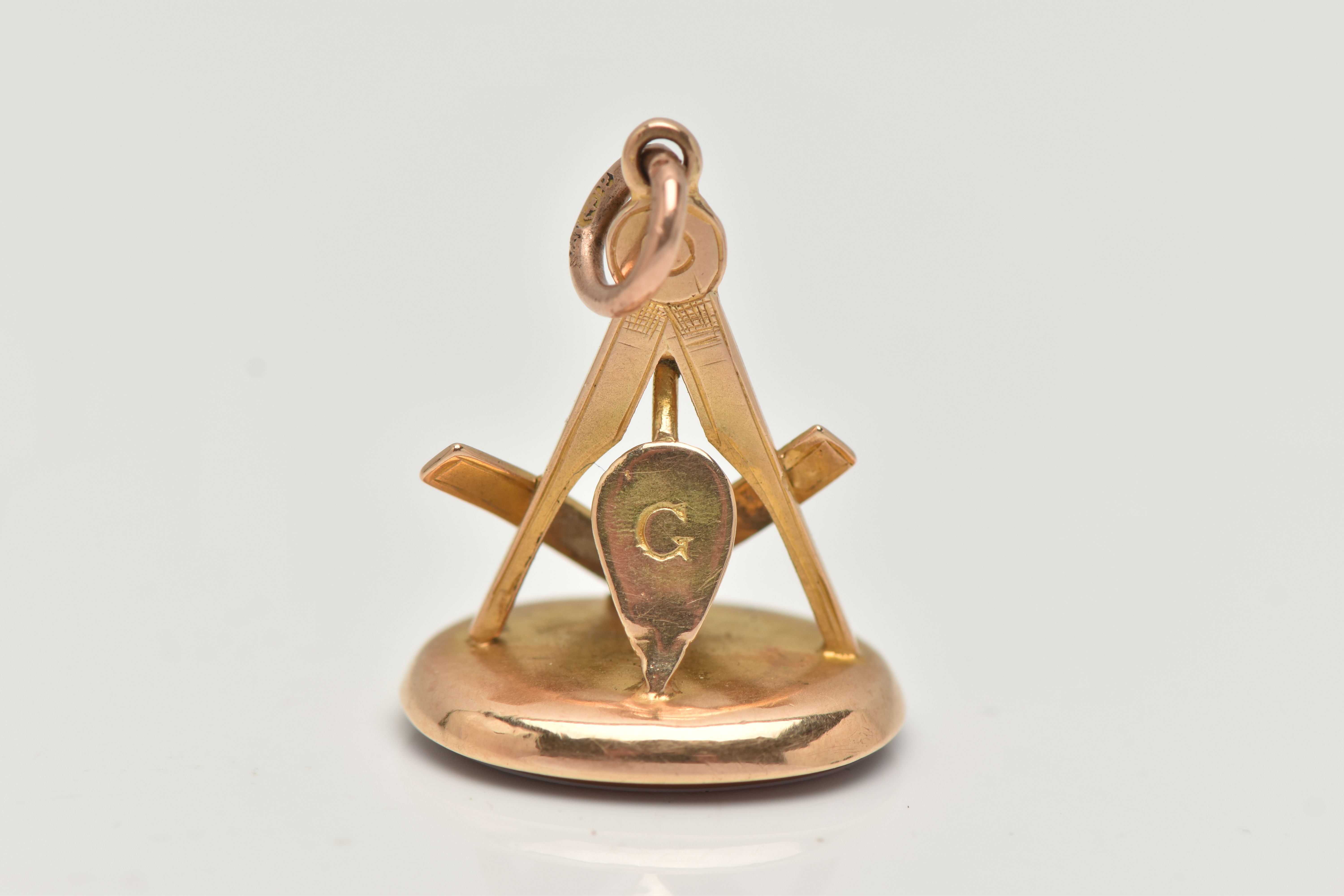 A MASONIC FOB, the oval chalcedony base, to the square and compass grip, suspension loop with rubbed - Image 2 of 3
